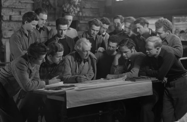 Frank Lloyd Wright at drafting table